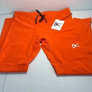 Orange Sweatpants by [Brand]
